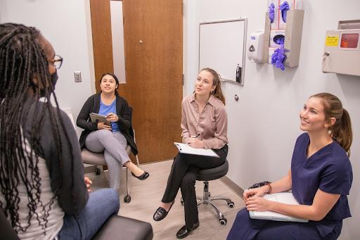 Students working in clinicals.