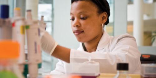 Researcher working in lab.